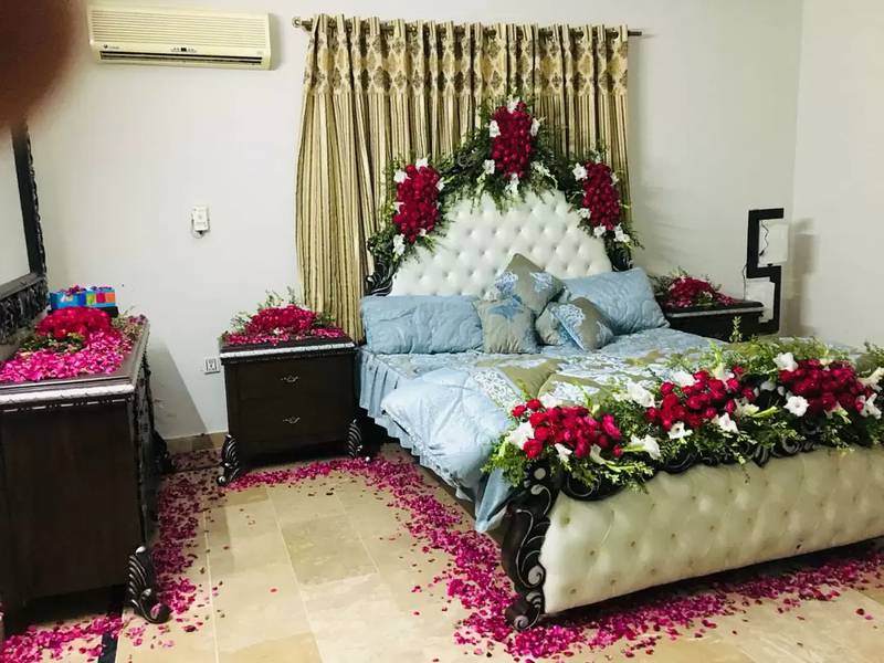 Fresh flowers Wedding bed wedding room decor available 3