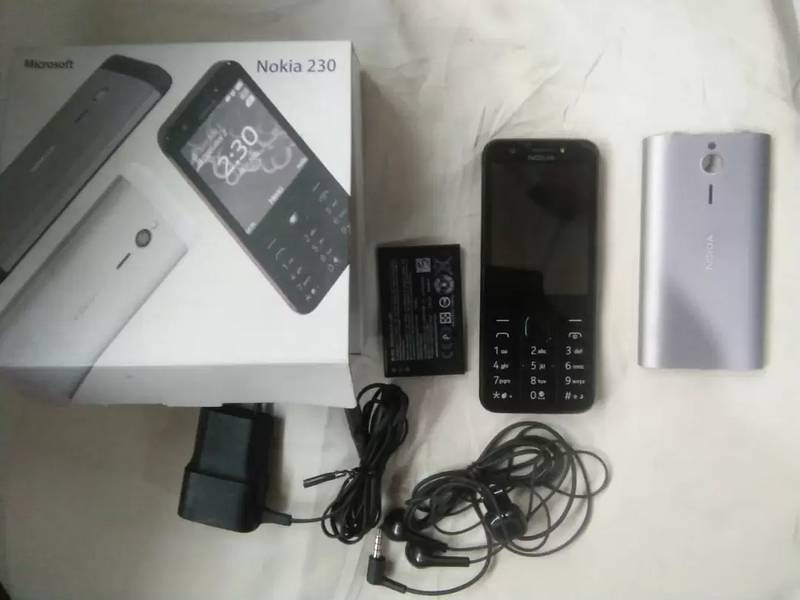 Nokia 230 orignal impot dubai condition 10/10 with chargr handfree box 3