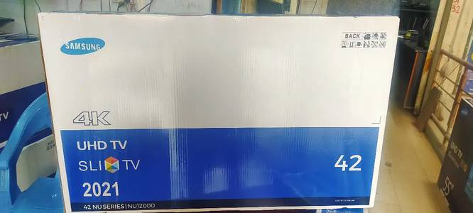 4K UHD LED TV 42 INCH BOX PACK SAMSUNG 2 YEARS WARRANTY CARD 2