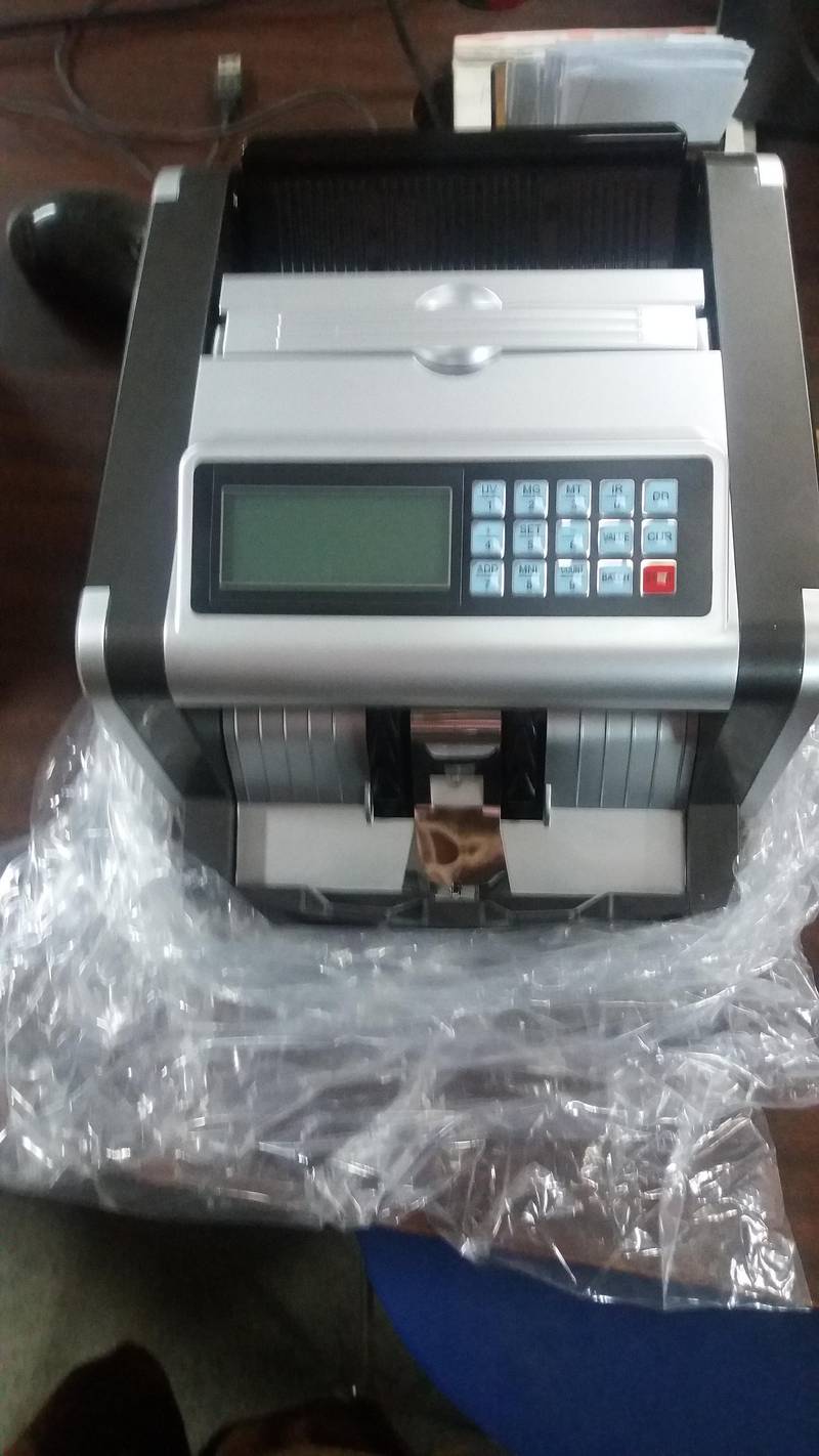 sale currency cash note counting machine with high fake note detection 15