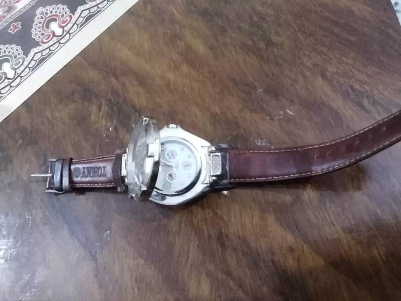 I have an entique watch Tommy hilfiger branded watch 1