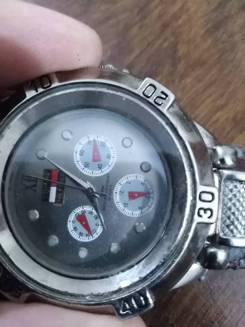 I have an entique watch Tommy hilfiger branded watch 3