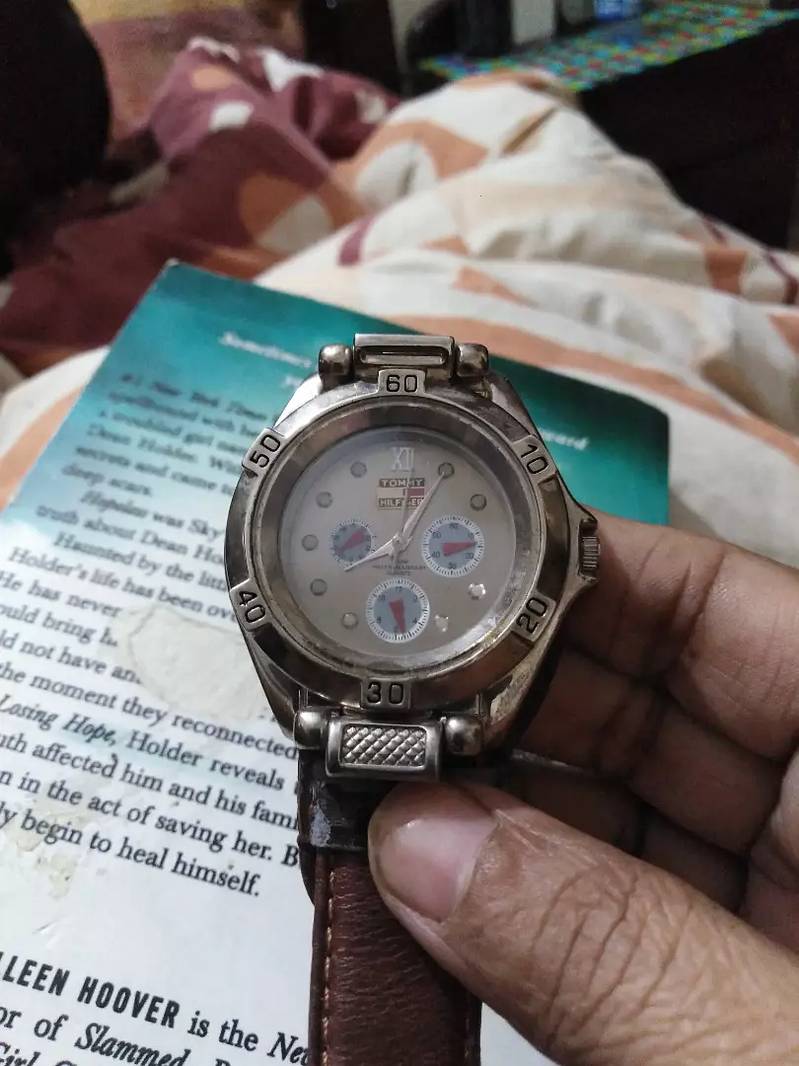 I have an entique watch Tommy hilfiger branded watch 7