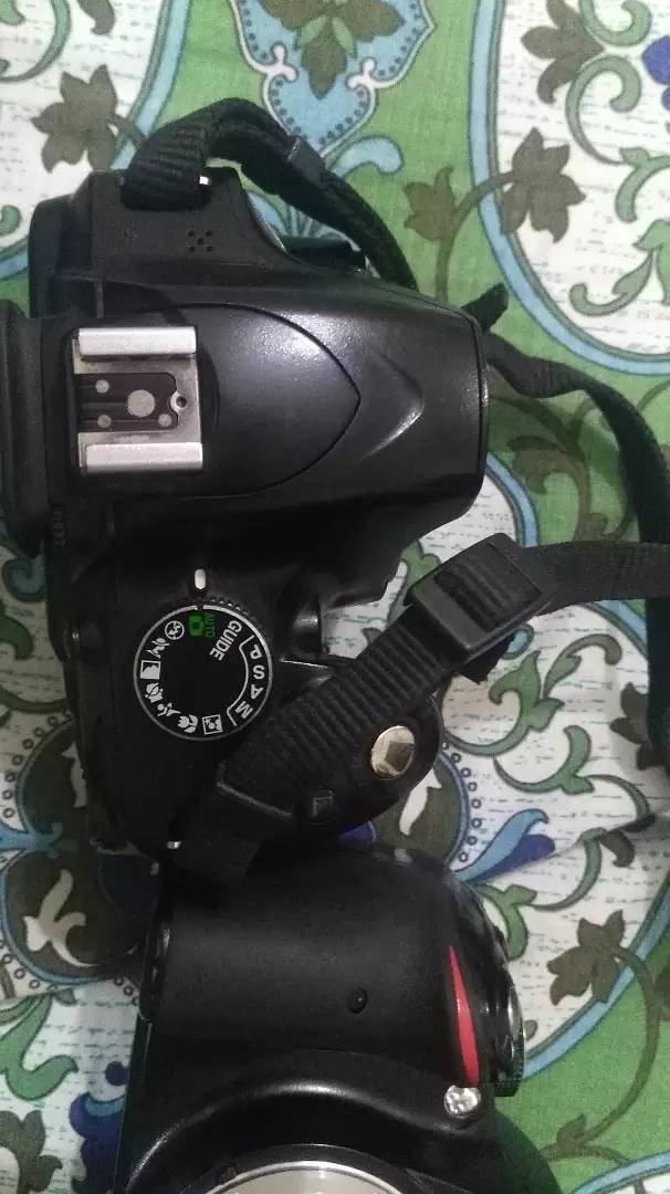 Nikon DSLR camera modal D3200 with total assessors 5