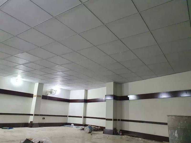 Pvc wall panel / false ceiling 2 x 2 / wooden flooring / ceiling 1