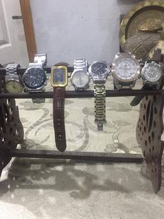 presents a vintage collection of brand wrist watchs fr men DIFER PRICE