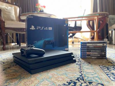 PS4 Pro, 1TB, Excellent condition with controller and 8 games