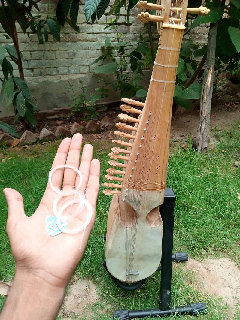 Rabab with extra strings and pick (good rubab) 0