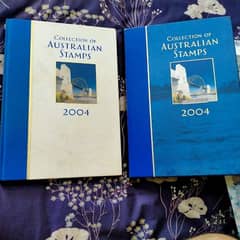 Pair of Two Australia Stamp Year Book 2004.