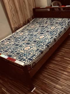 WOODEN BED  size 4ft by 6 ft with master molty foam
