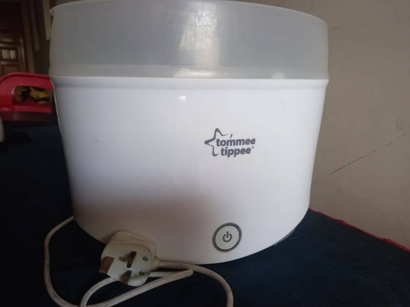 Feeder sterilizer by tommee tippee used 0