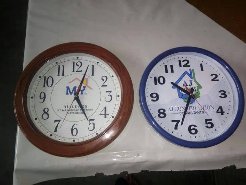 wall clock with company logo 8