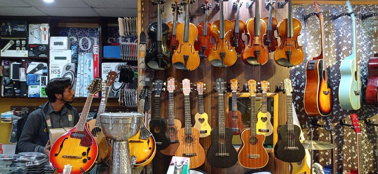 Branded ukuleles collection at Acoustica guitar shop 2