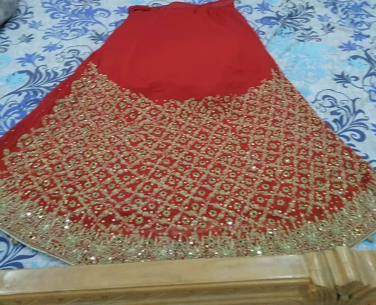 red lehnga in large size 1