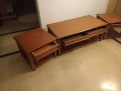 coffee table with 2 side tables with drawers.