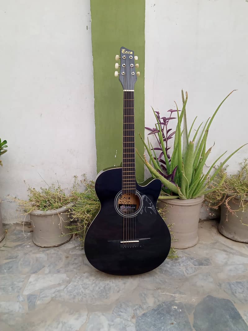 Branded Acoustic Guitar 13