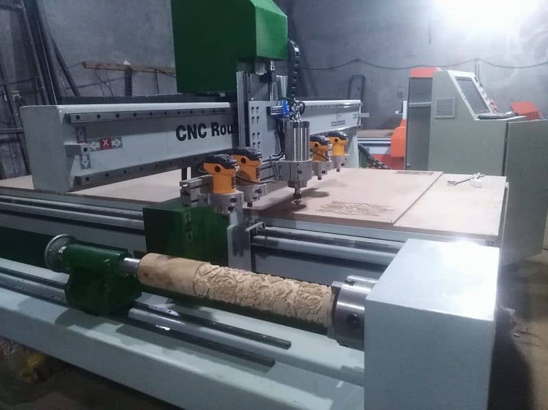 CNC WOOD ROUTER 4 axis  AND MARBLE  ROUTER MACHINE 0