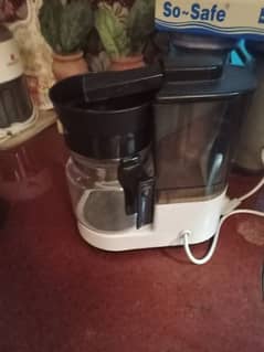 imported coffee maker with a box of filters