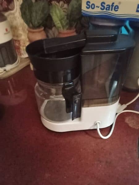 imported coffee maker with a box of filters 0