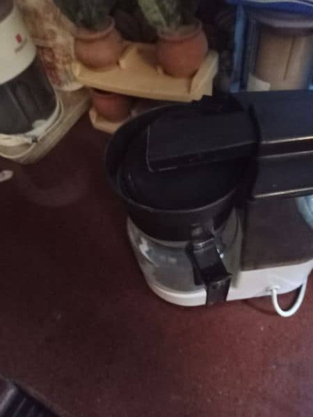 imported coffee maker with a box of filters 1