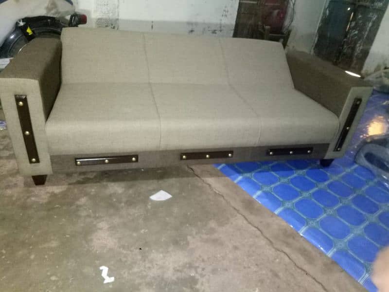 SOFA CUM BED WITH ARM REST 15