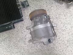 Duet compressor and condenser for car ac