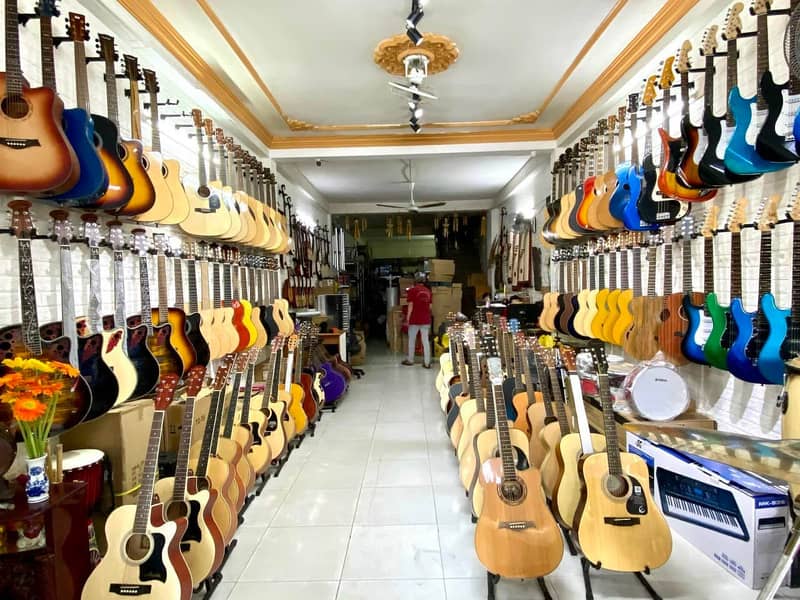 The Guitar Store Pakistan Biggest Variety of Guitars violins Musical 0