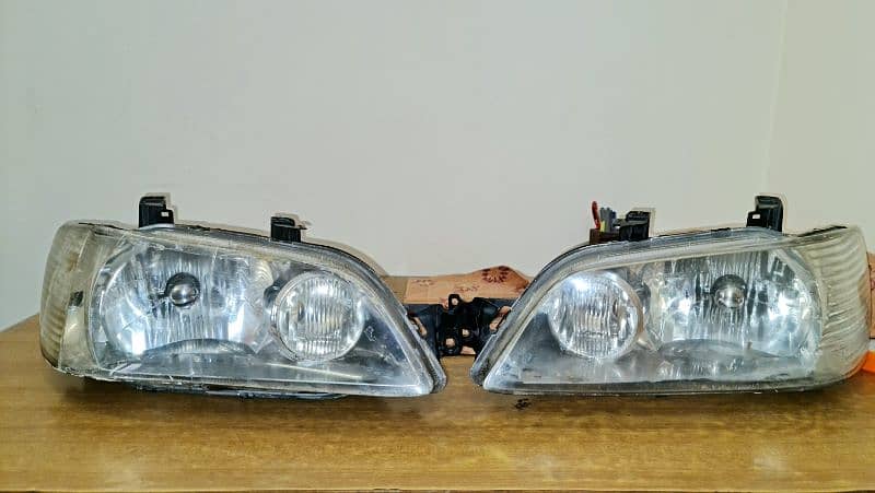 Mitsubishi Lancer Cedia Geniune Headlights 1