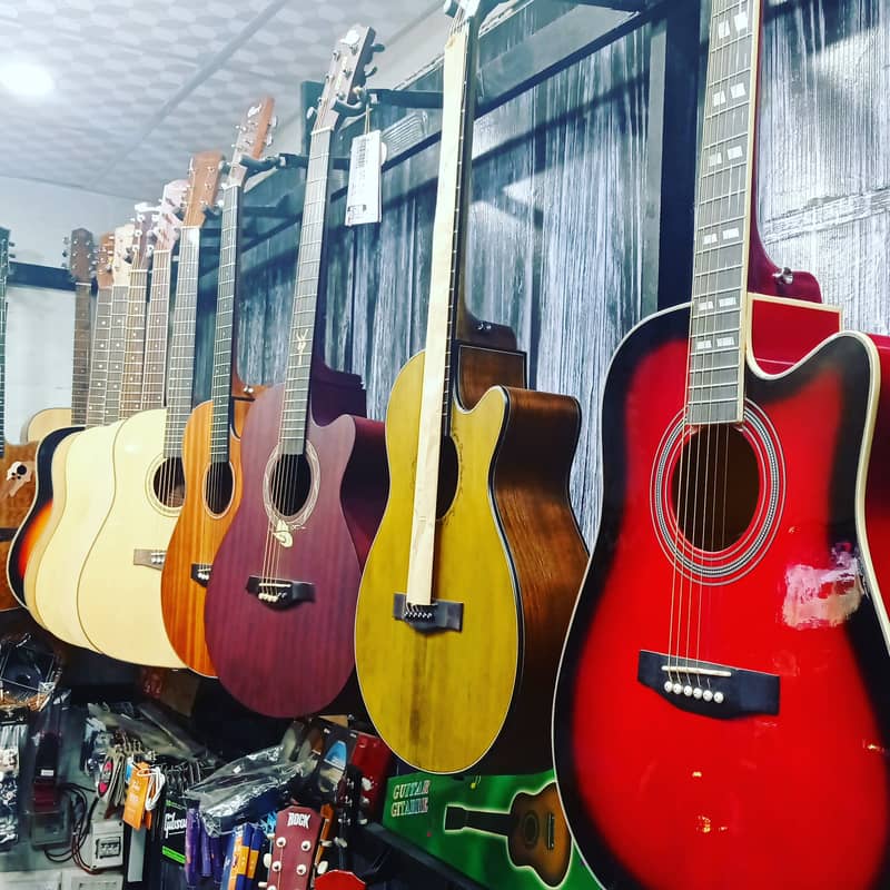 Quality guitars collection at Acoustica Guitar Shop 0