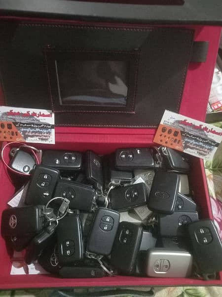 Auto key maker all types cars key making smart key programming karachi 0