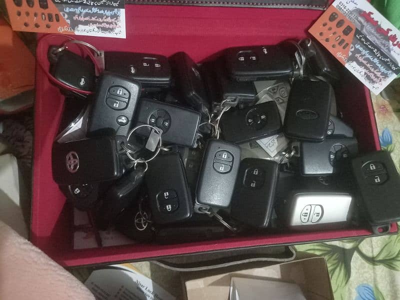 Auto key maker all types cars key making smart key programming karachi 4