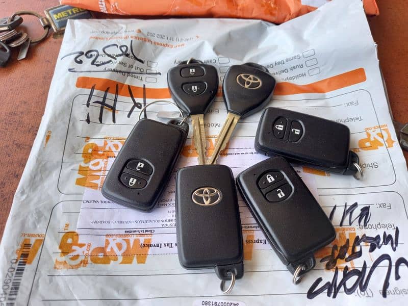 Auto key maker all types cars key making smart key programming karachi 13