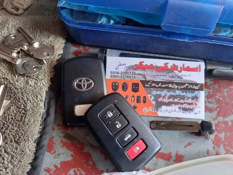 Auto key maker all types cars key making smart key programming karachi 15