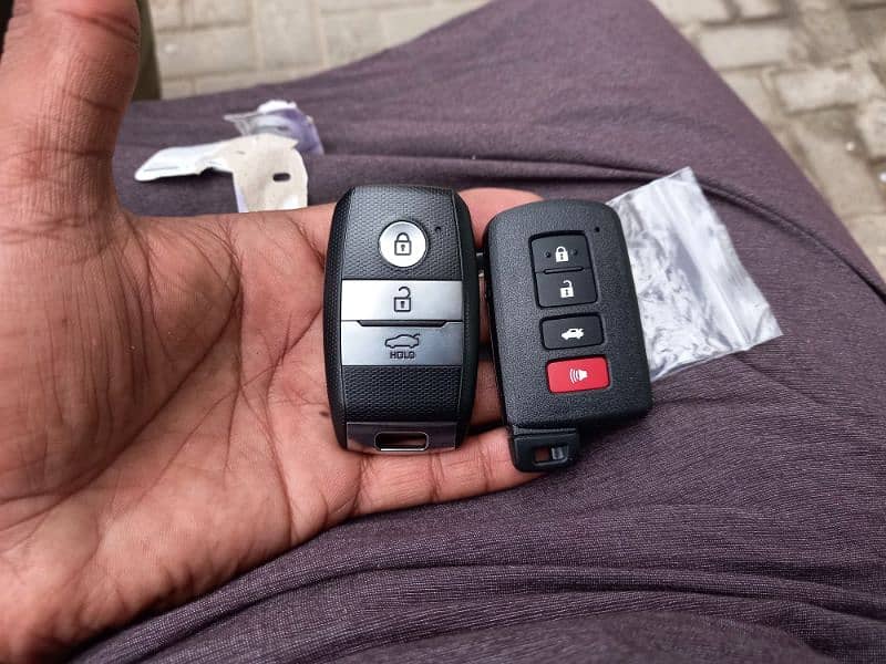 Auto key maker all types cars key making smart key programming karachi 18