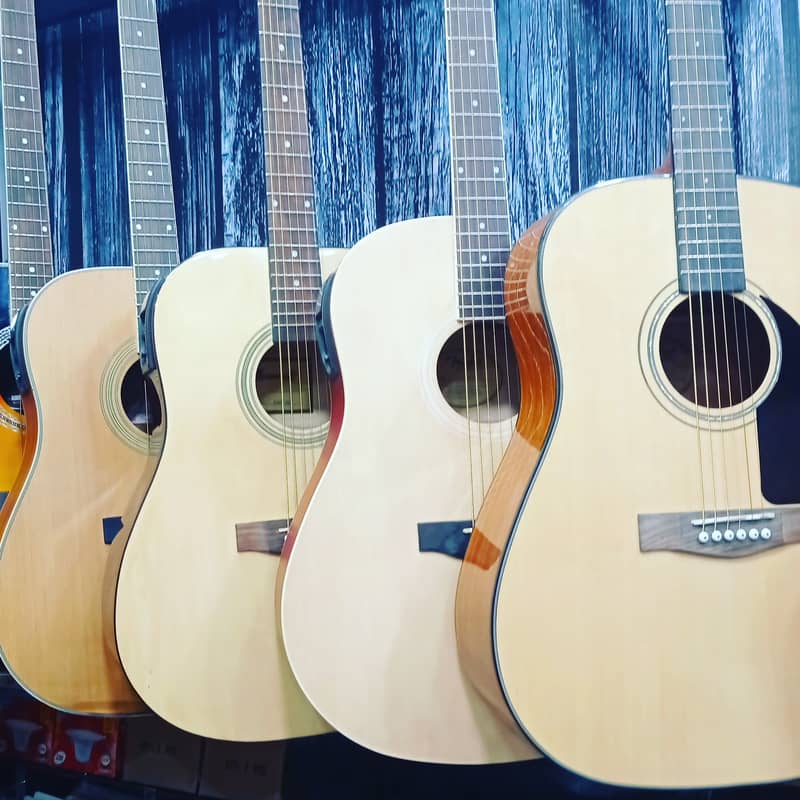 Quality guitars collection at Acoustica Guitar Shop 0