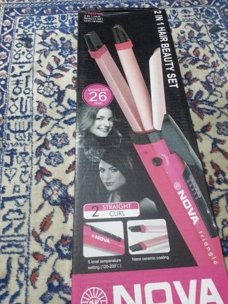 Nova straightener & curler. . . . 1