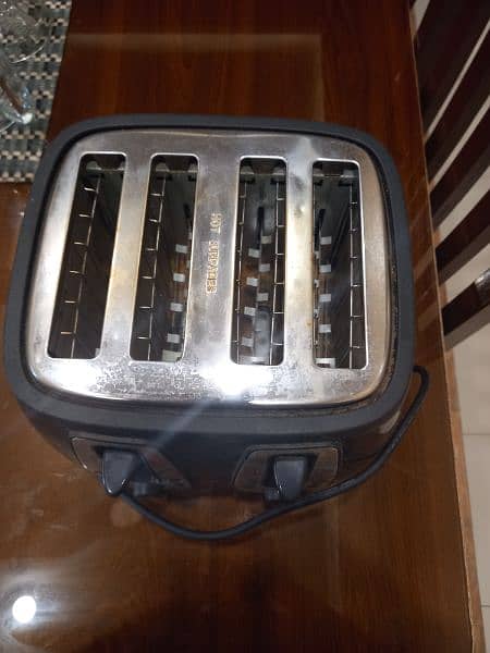 four slice toaster with hot plate 0