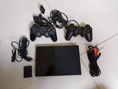 Play Station 2 (PS2) with 2 controllers