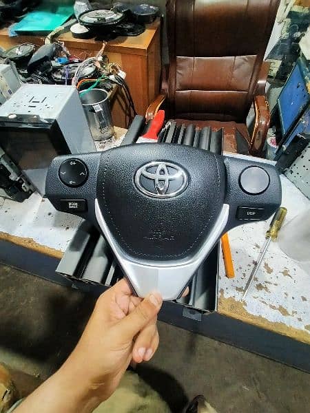 Corolla steering wheel button 8