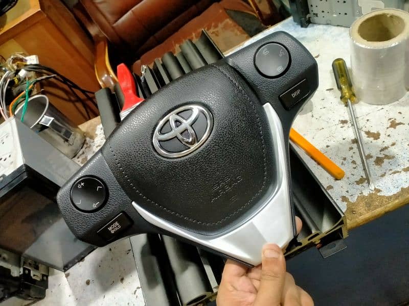 Corolla steering wheel button 9