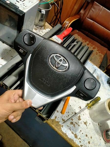 Corolla steering wheel button 11