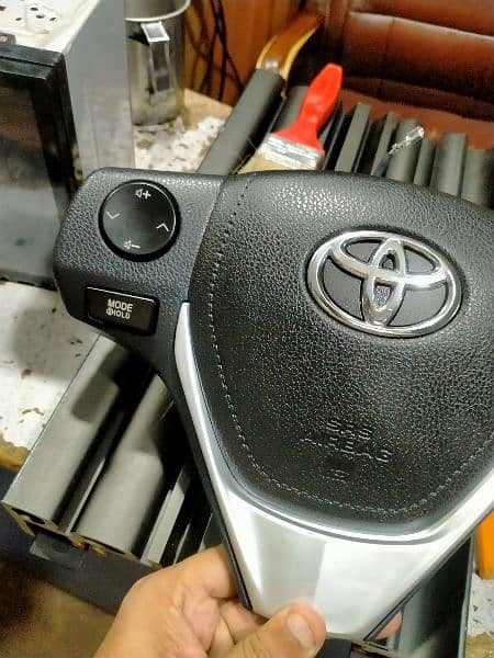 Corolla steering wheel button 13