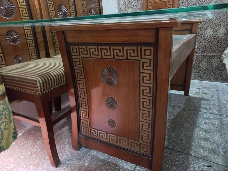 dining  table with a set of six big chairs 4