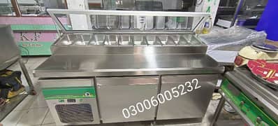 pizza make prap table for dressing we hve pizza oven,deep fryer, table