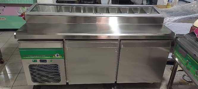 dressing table fast food or pizza we hve pizza oven, dough mixer etc 3