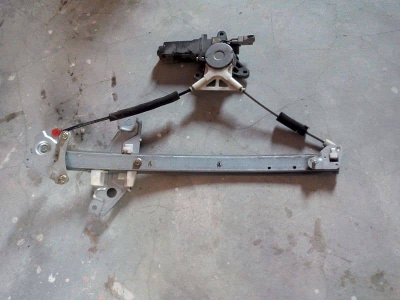 Toyota Indus Corolla genuine left side power window machine and motor 0