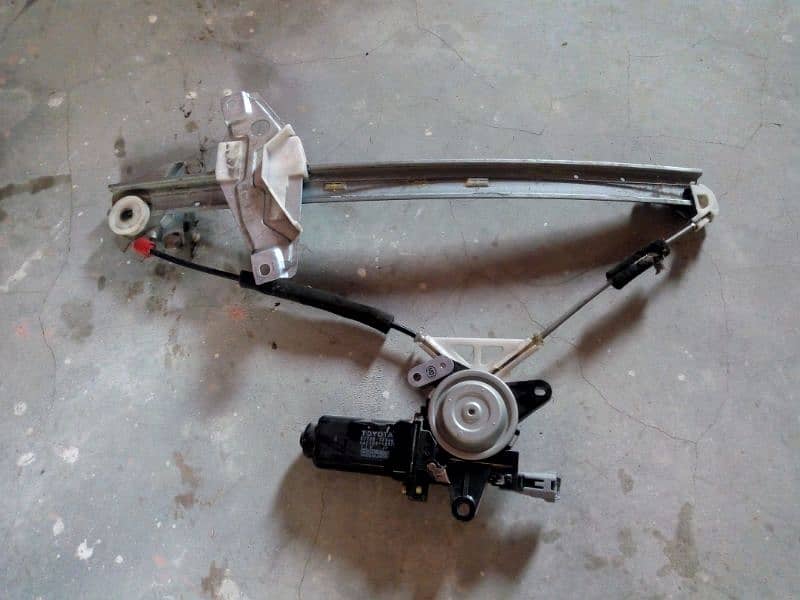 Toyota Indus Corolla genuine left side power window machine and motor 2