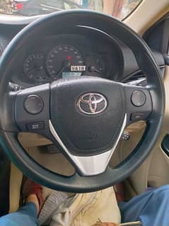 Toyota Yaris steering multimedia button