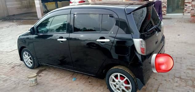 Dihatsu Mira black colour in mint condition.