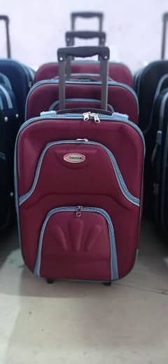 navy and brown luggage